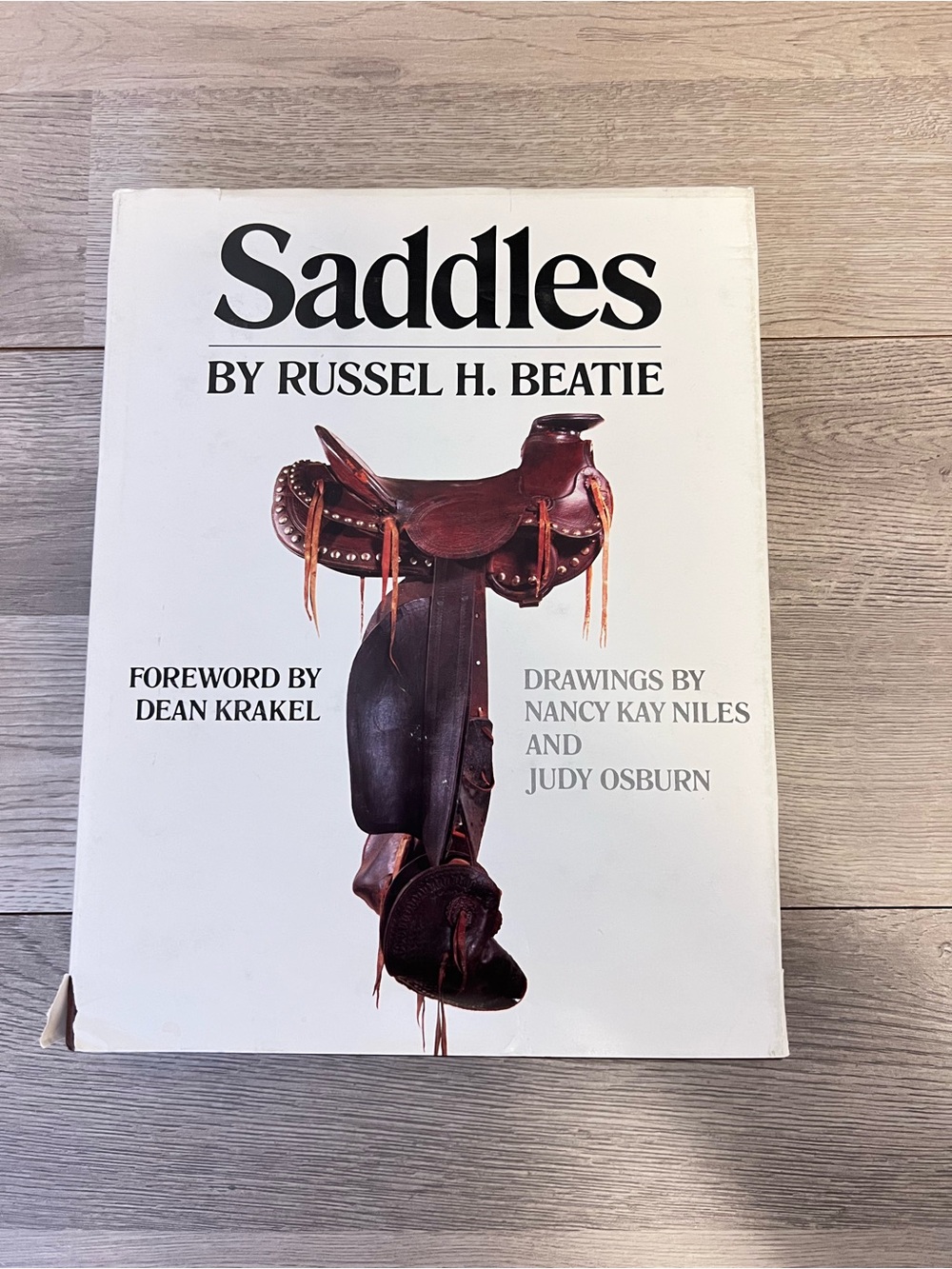 Saddles Hardcover Book by Russel H. Beatie